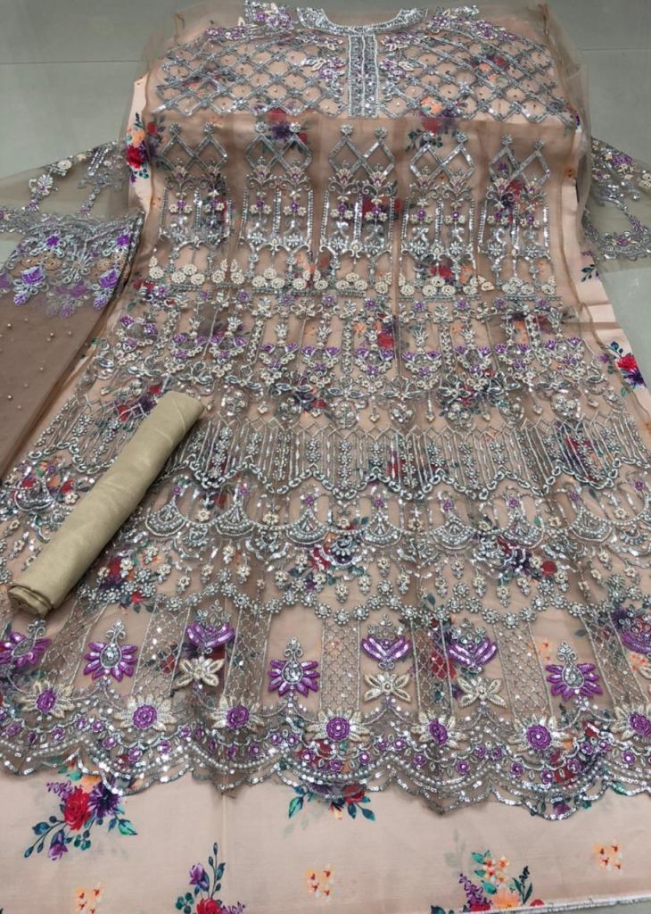 Presenting the new trend of net Onion Colour Gown of net fabric –  Halfsaree-studio