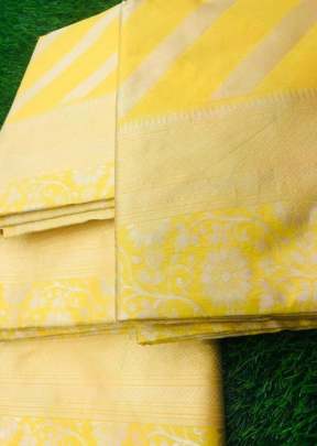 A soothing Banarasi silk Yellow Leheriya  with silver jari border Saree designer sarees