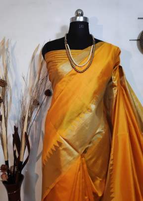 Beautiful Aasam silk weaving saree with zari woven temple border In Turmeric SILK SAREE