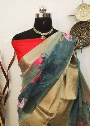 Beautiful Organza With Elegant Zari Wooven Contrast Colour Pallu In Light Bottle Green organza saree