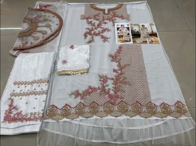 Exclusive Beautifully Design Pakistani Suit With Embroidery Work In White Pakistani Suits