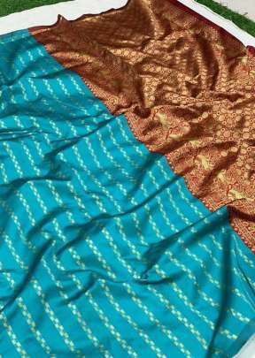 Sky blue kanchivaram silk with Red border featuring bhuttas Saree Kanchipuram Silk Saree